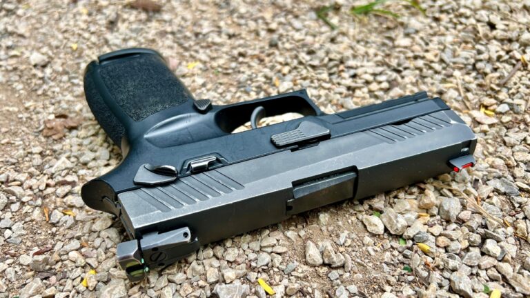 Gun carrier says his pistol got yanked out of the holster by his car door pillar and landed on the pavement in broad daylight