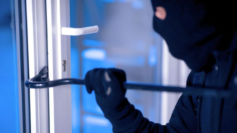 Homeowner says intruders crashed through his front door after midnight — and he ended up facing them from the stairs with a Glock in his hand