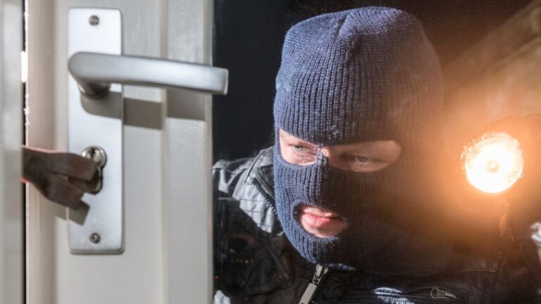 Homeowner says his wife was home alone when a man in a ski mask started pounding on the front door — and the whole thing only ended when he leveled a shotgun at the entry and the banging stopped