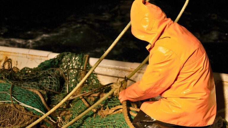 Fisherman says he was on an abandoned truss bridge after dark when he heard voices below — and then realized the men under him were talking about seeing his truck and coming up to get him