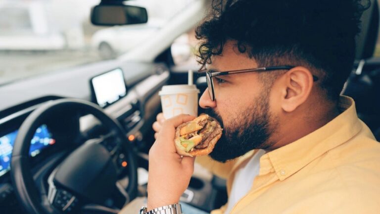 Driver says he was eating a burger in a Walmart parking lot — and then a man started walking at his car from the shadows with a knife in his hand