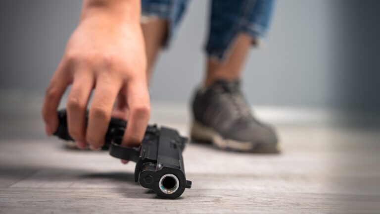 Carrier says his holster snapped at the checkout line — and his gun hit the grocery-store floor in front of a crowd