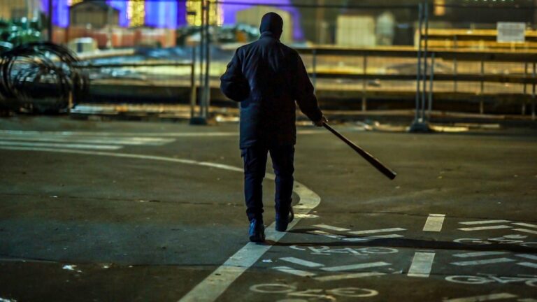 Man says he and his wife were walking home around 2 a.m. after a Fourth of July celebration — and then the stranger behind them suddenly broke into a sprint