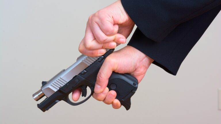 Man says two guys tried to kick in his apartment door while he was home alone — and the only thing that stopped the next kick was the sound of a round being chambered