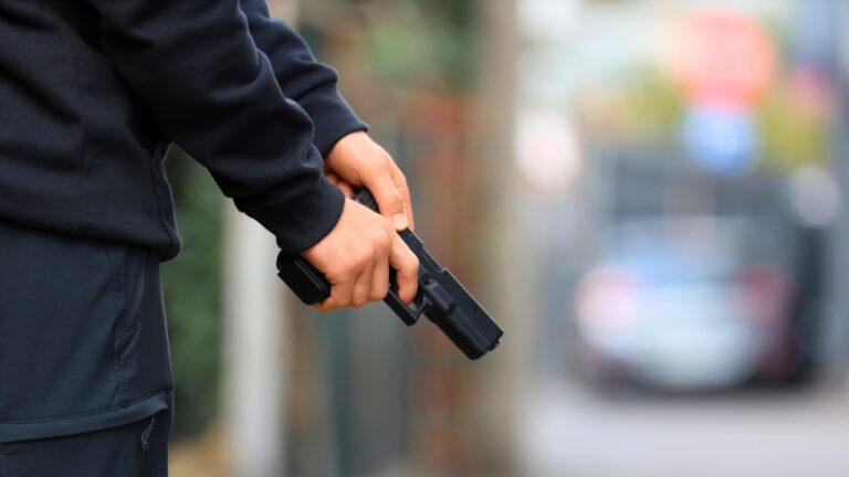 Man says he was standing outside a friend’s house for barely two minutes — and then he heard footsteps in the abandoned yard next door before two hands appeared over the fence