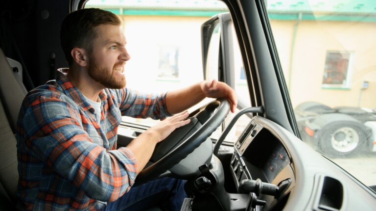 Driver says a furious stranger stopped beside his truck insisting his wife was hidden inside — and then came at the door with a screwdriver