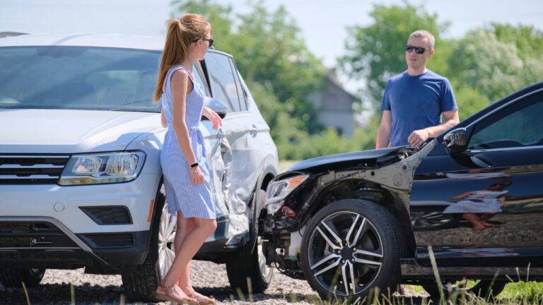 Driver says a woman waved him down after a crash — and then a man jumped out of the darkness and tried to force his way into her car