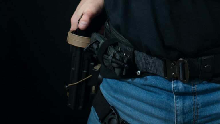 Carrier Nearly Had a Negligent Discharge While Adjusting His Rig — Then the Real Problem Was Handling the Gun at All